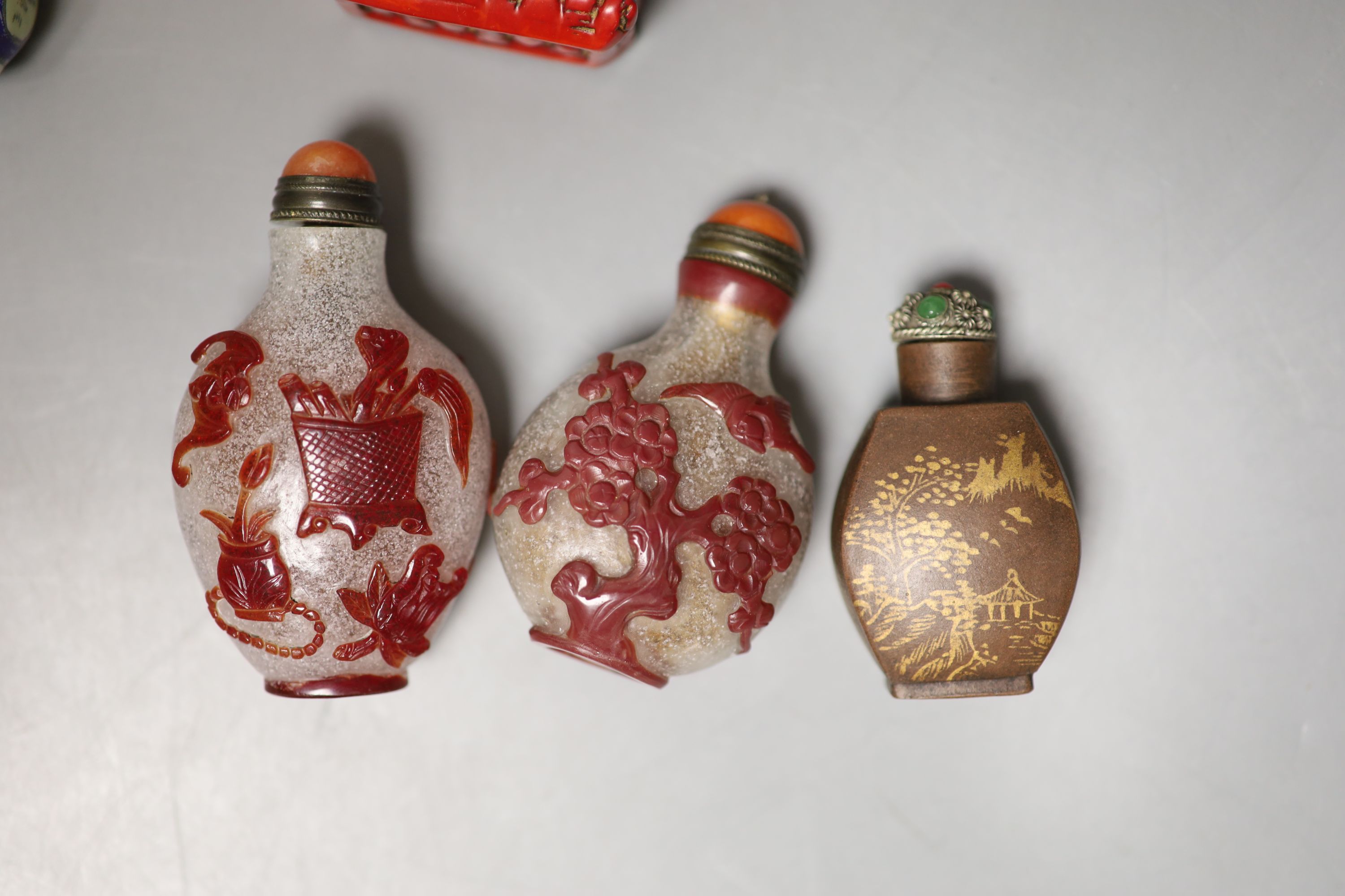 A collection of Chinese snuff bottles, with the best examples in separate bags